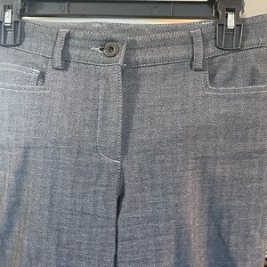 Worth gray herringbone design. Fitted to knee with slight flare